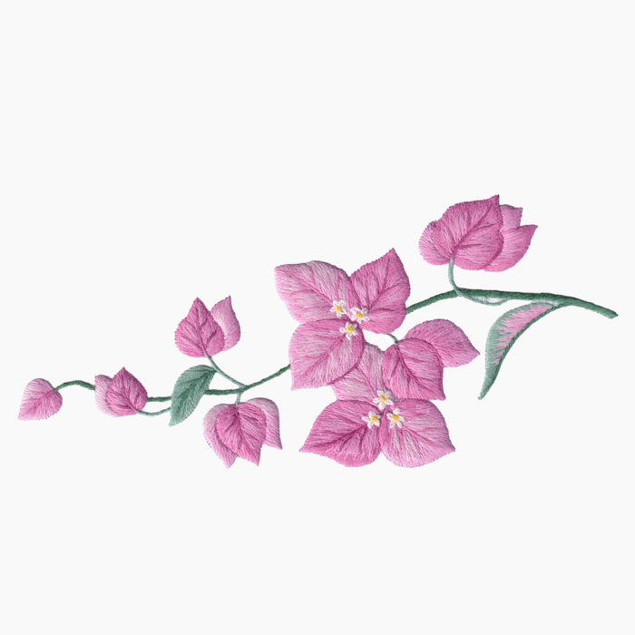 Hand embroidered cotton towel with pink bougainvillea flowers on a white background