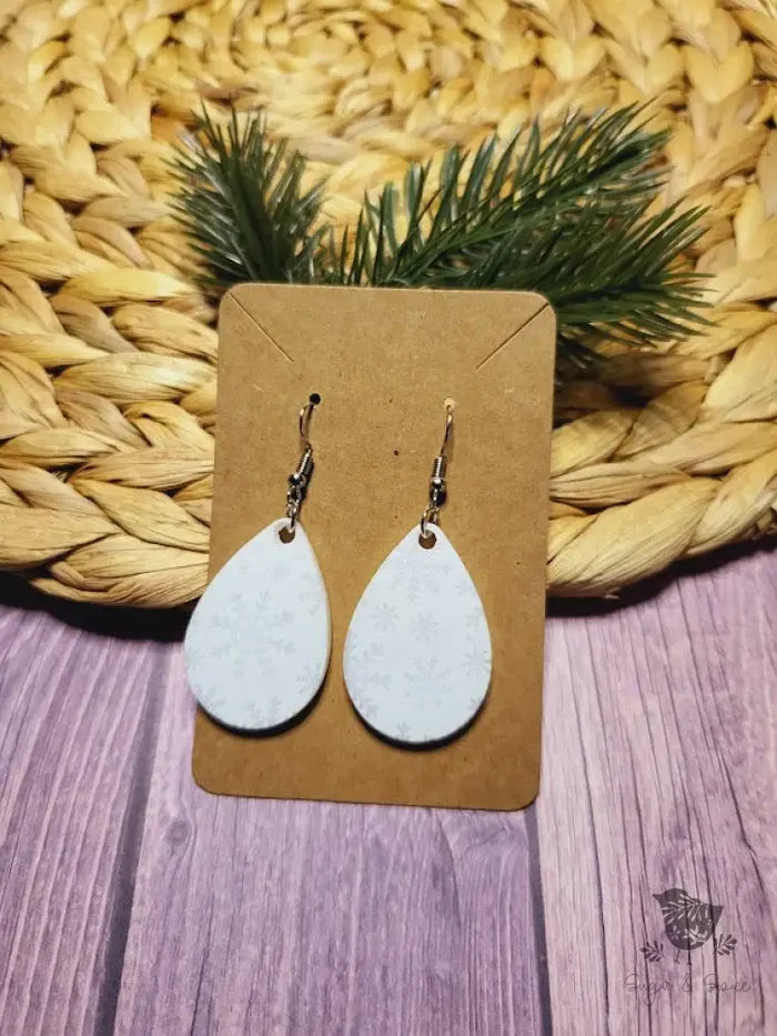 White Snowflake Holiday Dangle Earrings - Premium  from Sugar and Spice Invitations - Just $11.25! Shop now at Sugar and Spice Paper